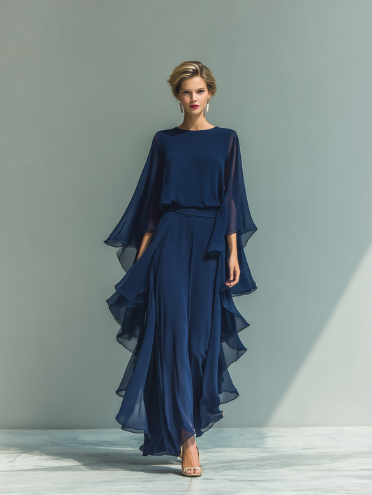 Conjunto azul marino con top de mangas acampanadas y pantalones rectos con detalles fruncidos
